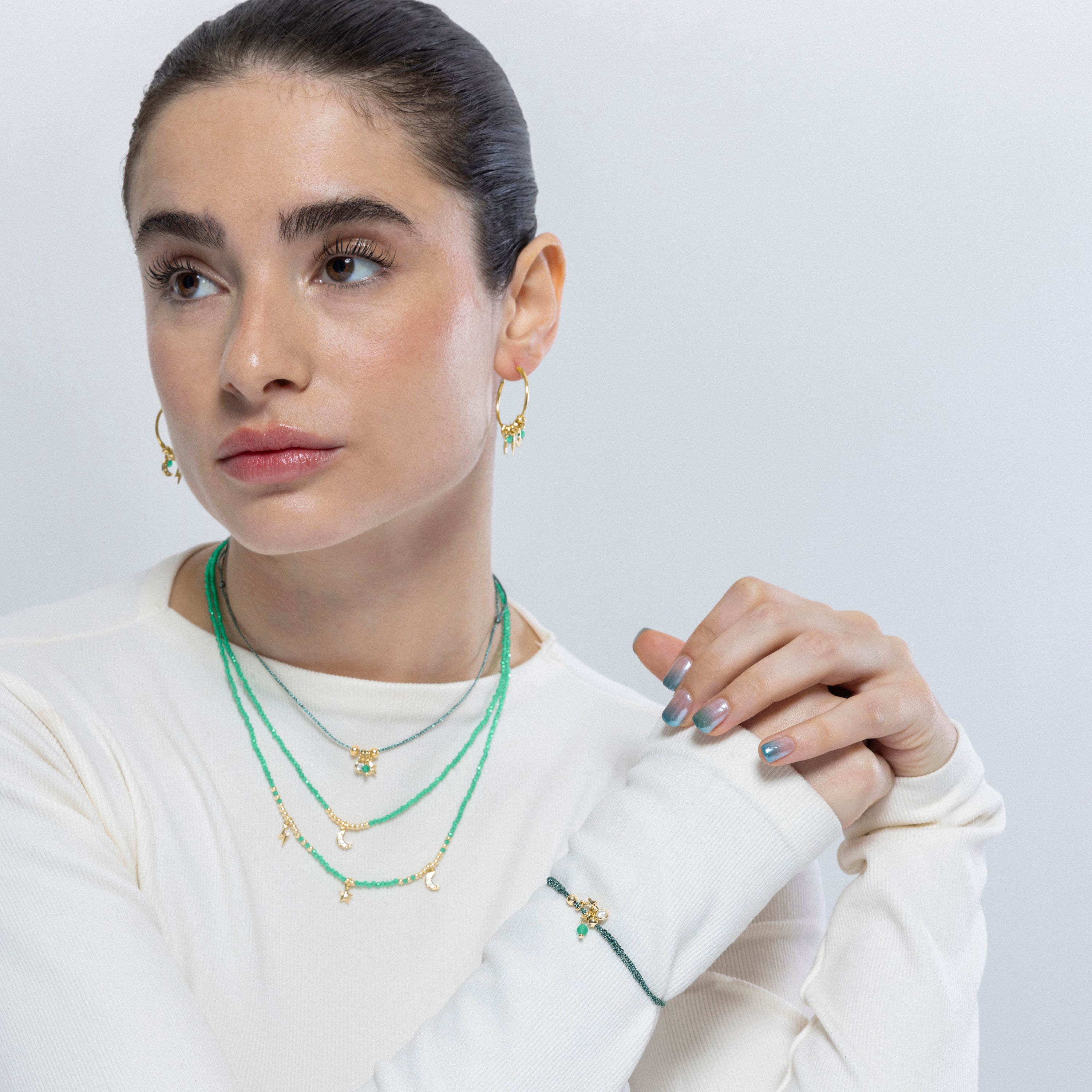 Pulseira de Prata de Lei 925 e Cristal Verde acabada em ouro amarelo de 18k - Estrela