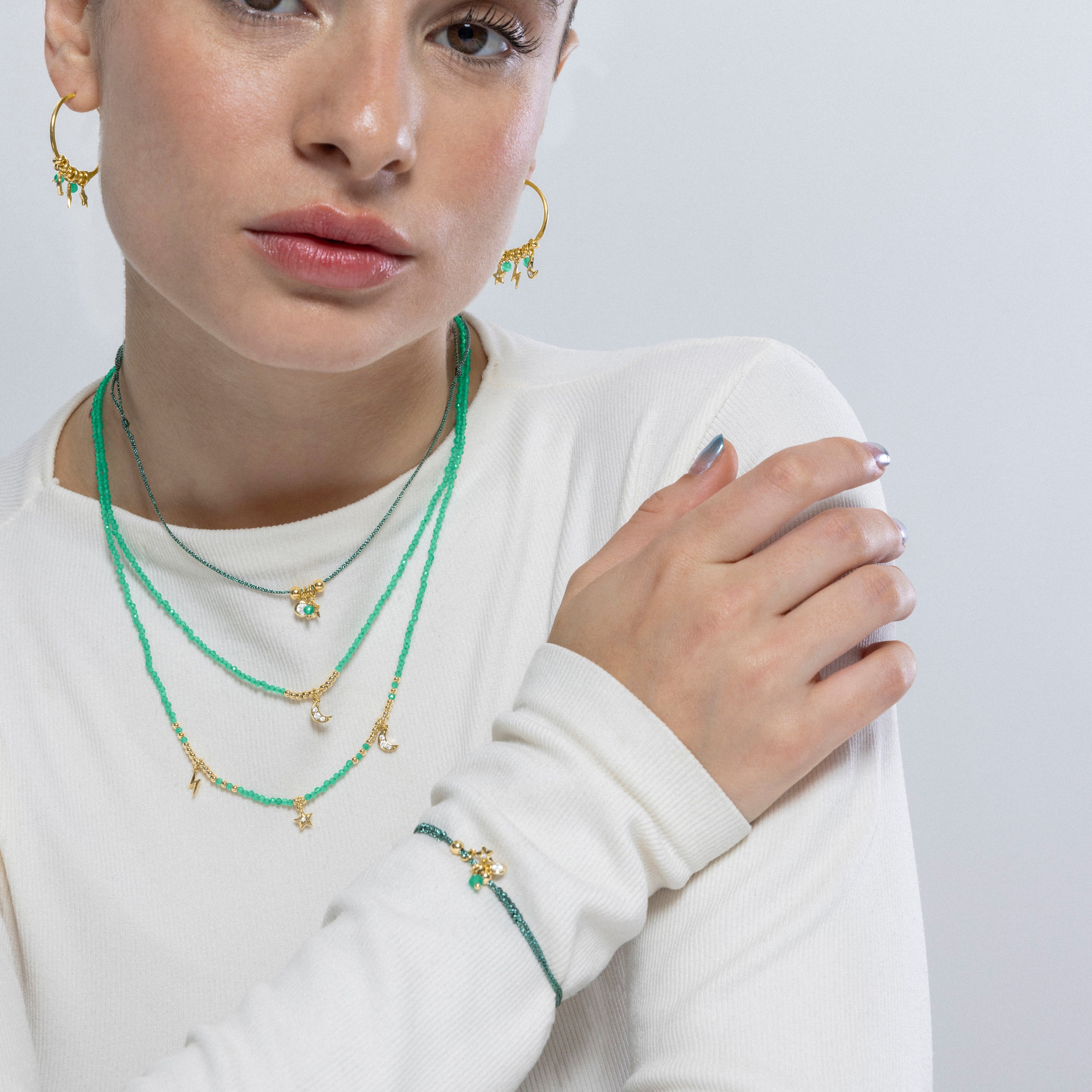 Pulseira de Prata de Lei 925 e Cristal Verde acabada em ouro amarelo de 18k - Estrela