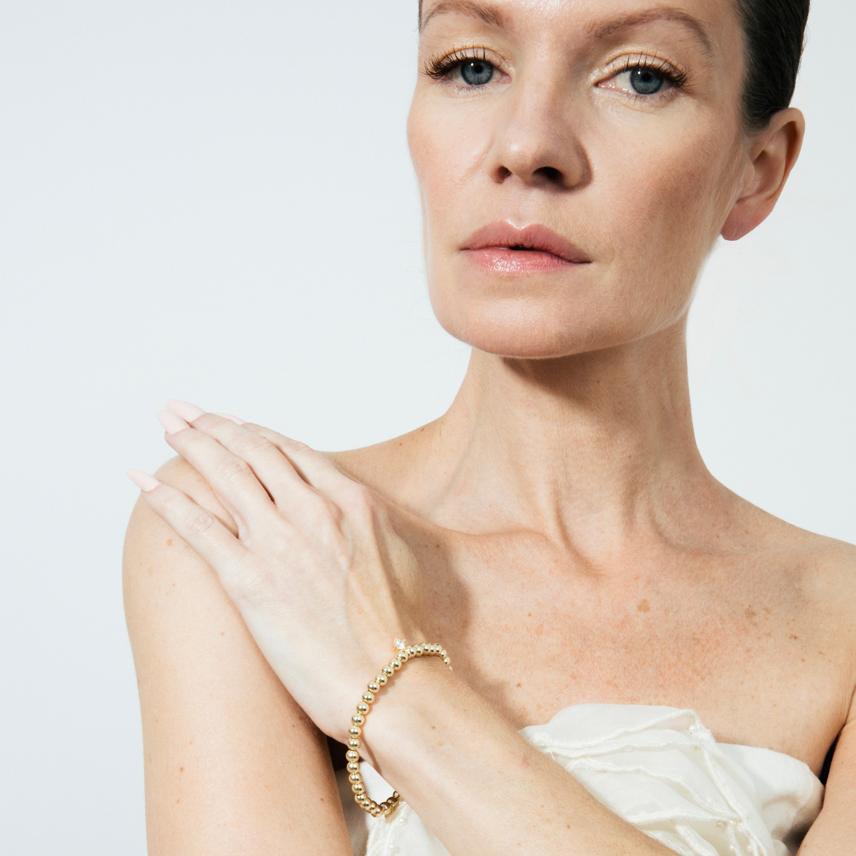 Pulsera de Plata de Ley 925 y Circonita Brillante acabado en oro amarillo 18k - Hawil