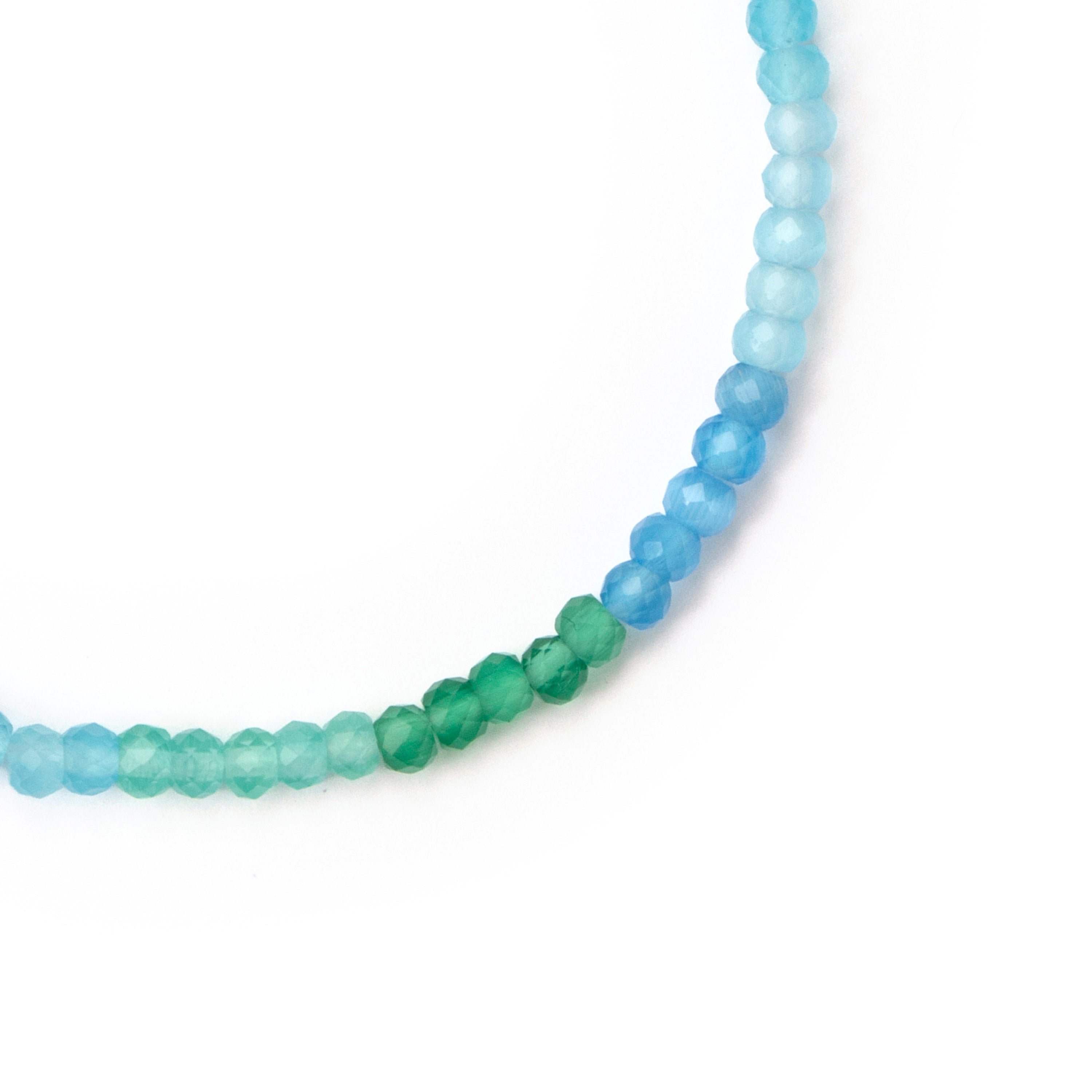 Armband aus 925er Sterlingsilber mit aquamarinblauem Zirkonia und 18-karätiger Gelbgoldauflage - Saino