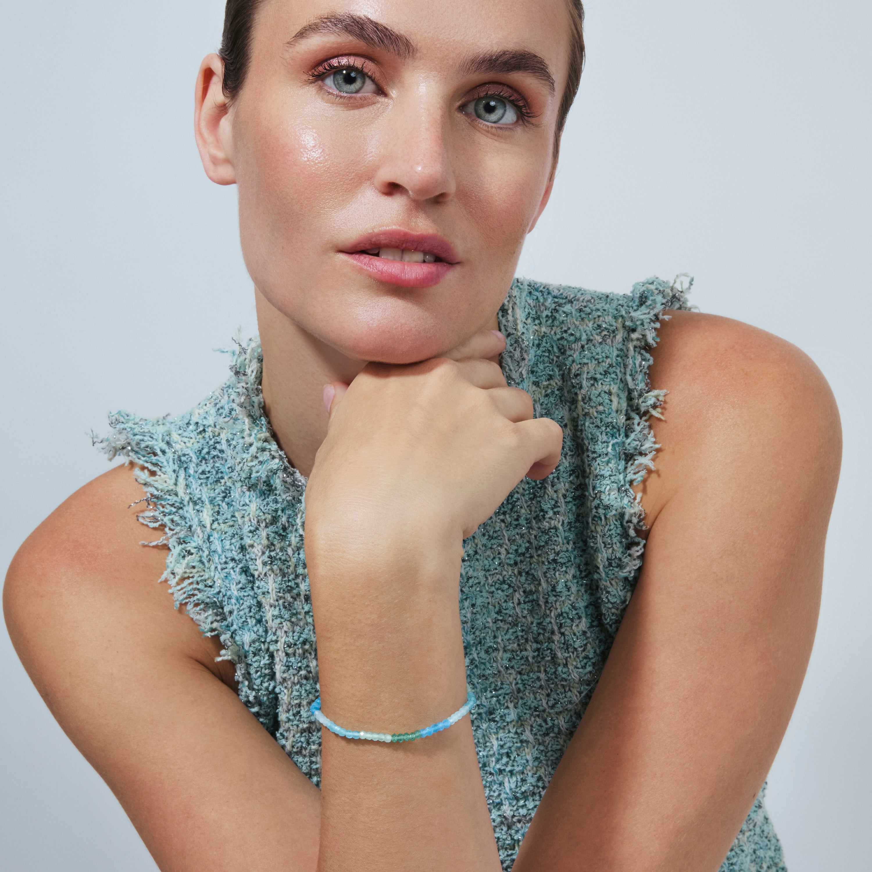 Armband aus 925er Sterlingsilber mit aquamarinblauem Zirkonia und 18-karätiger Gelbgoldauflage - Saino