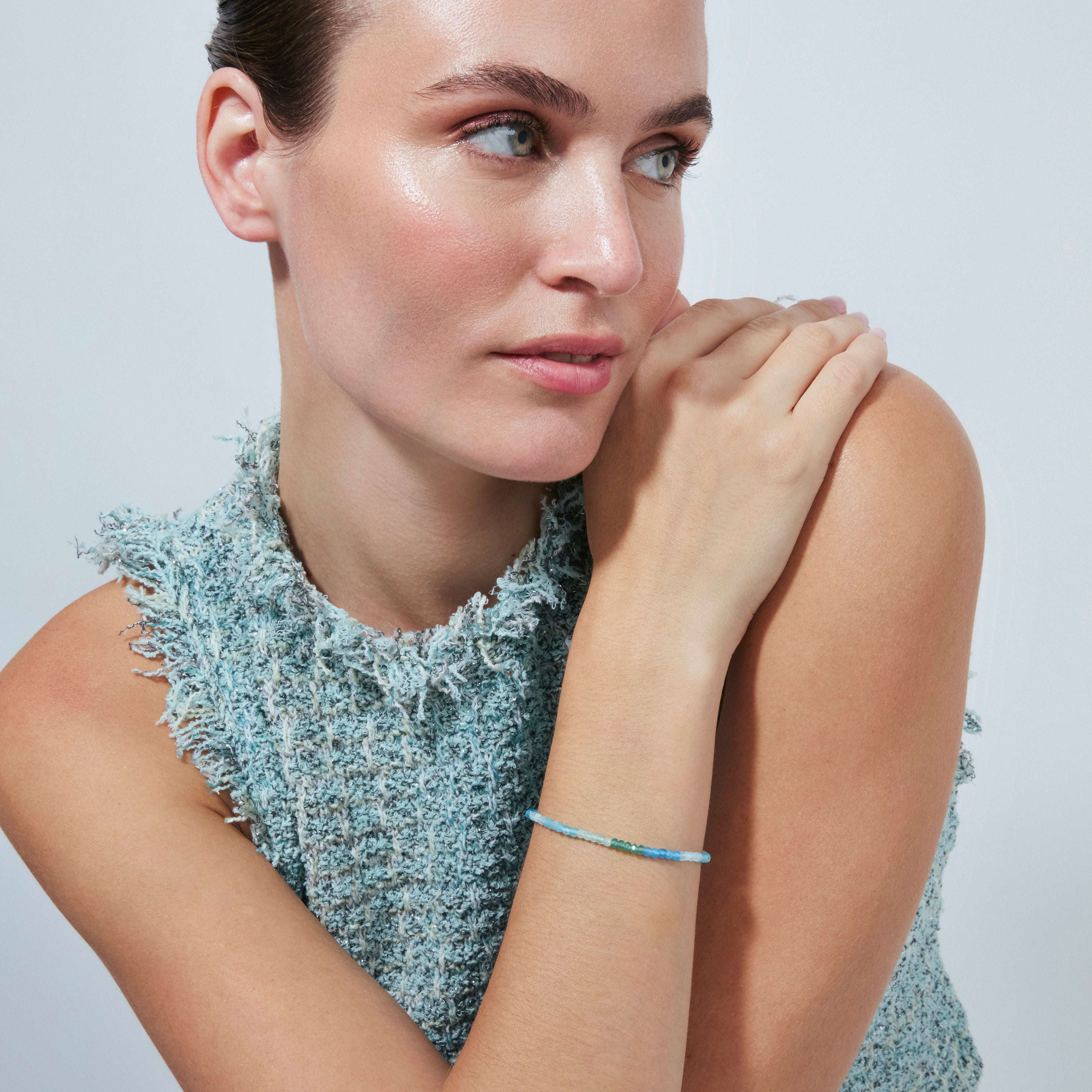 Armband aus 925er Sterlingsilber mit aquamarinblauem Zirkonia und 18-karätiger Gelbgoldauflage - Saino