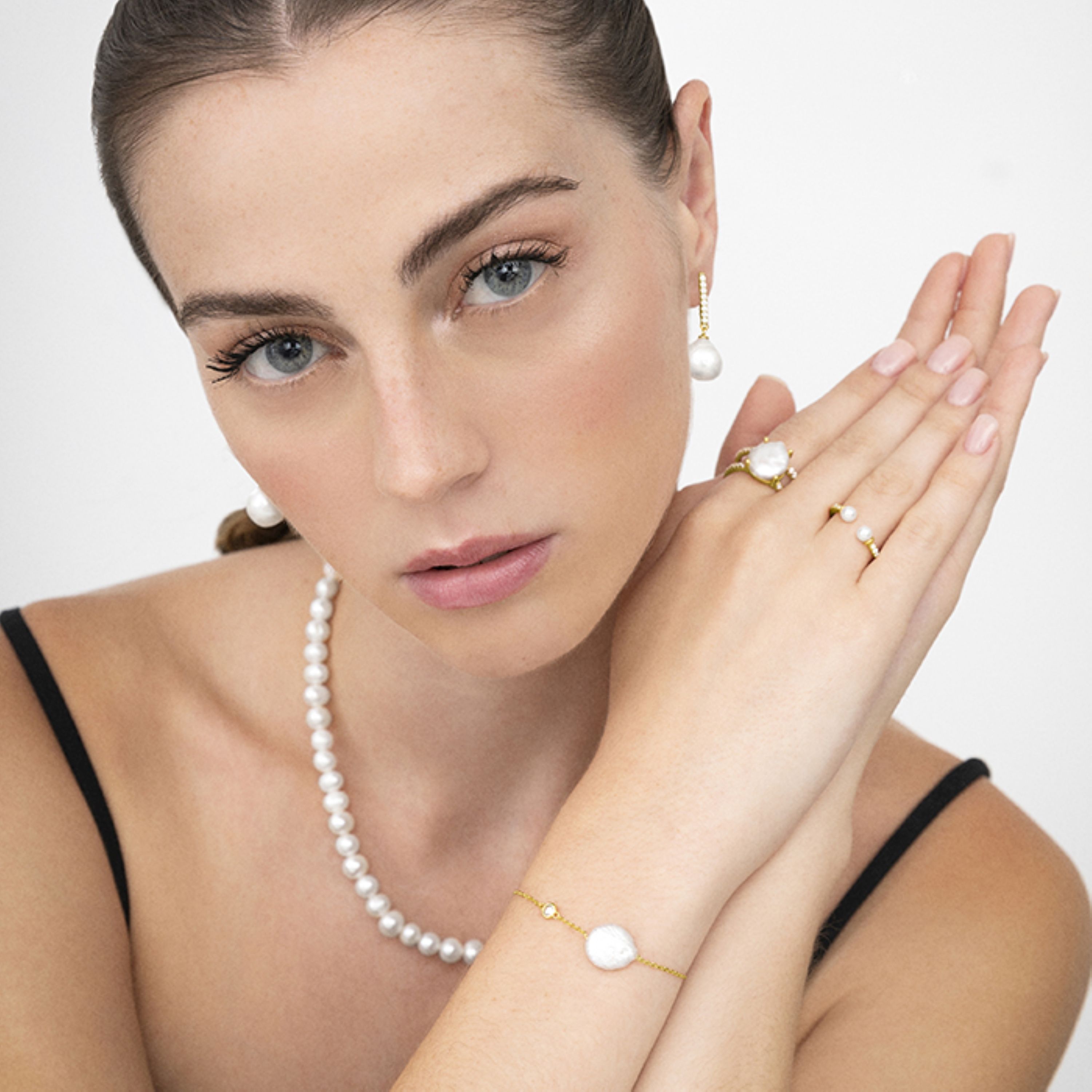 Pendientes de Plata de Ley 925 con Perla Blanca acabados en oro amarillo de 18K - Nolshu