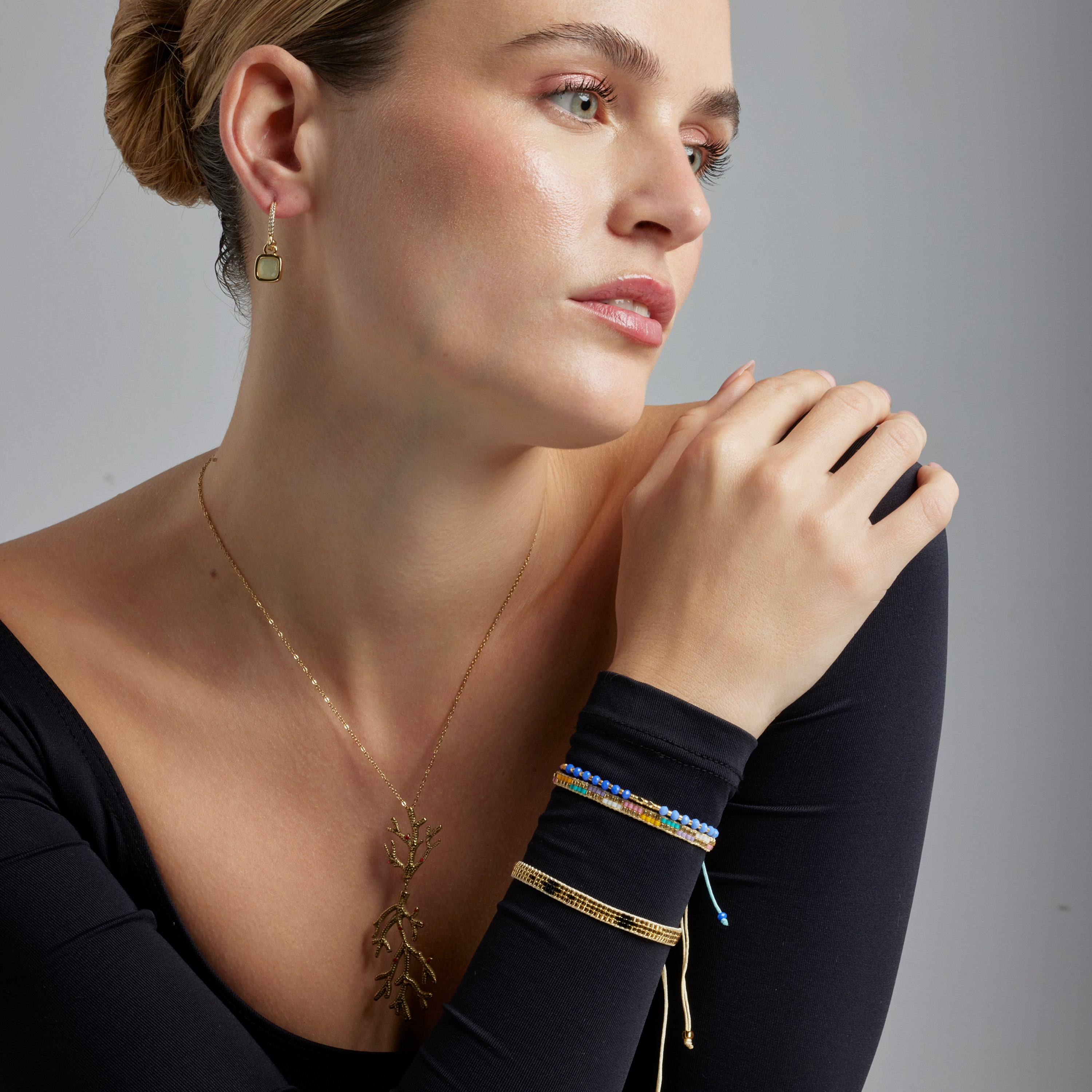 Pulsera con Cristal Azul acabado oro 18k - Anlako