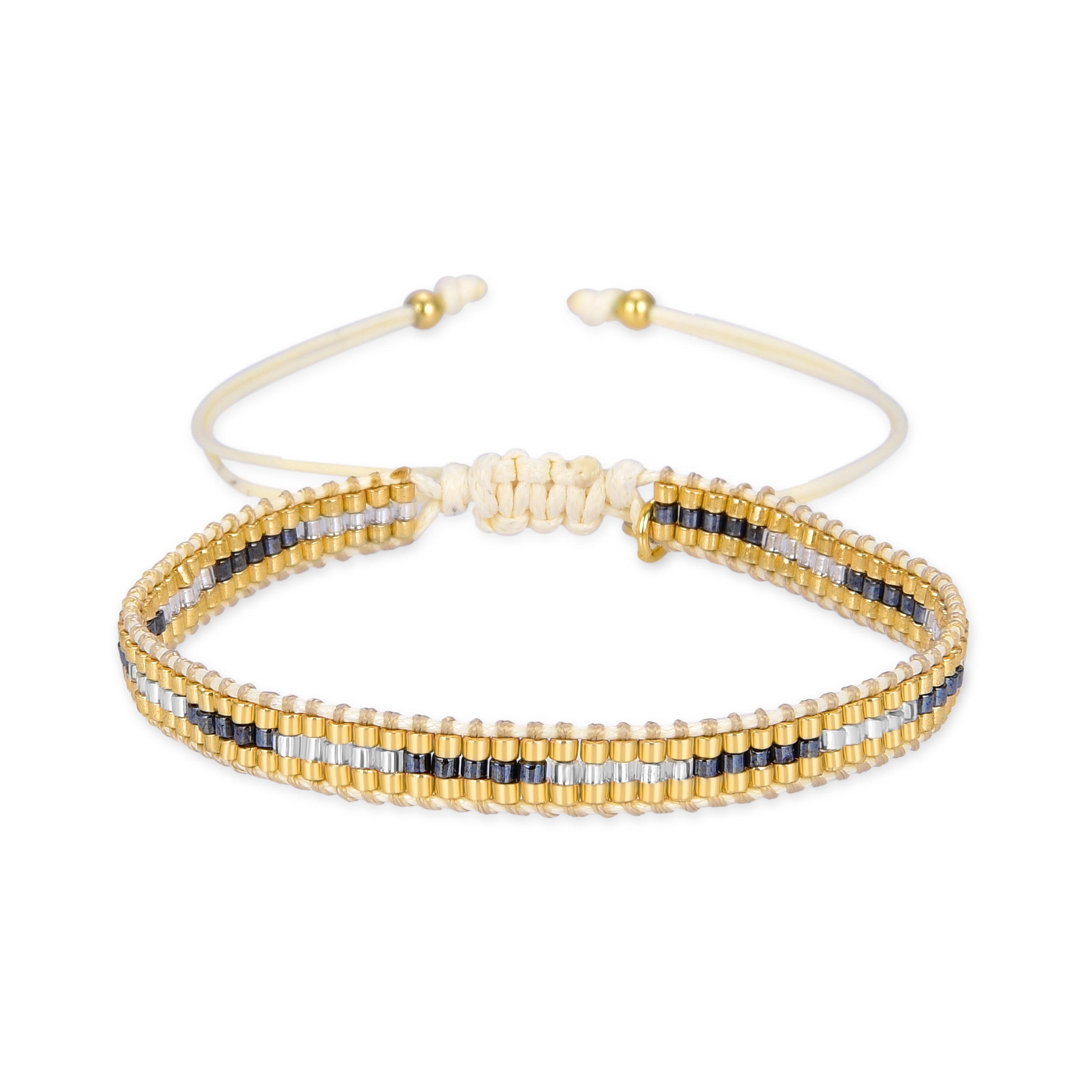 Pulsera Africa acabada en oro amarillo de 18k con cristal azul Pulsera Africa acabada en oro amarillo de 18k con cristal azul