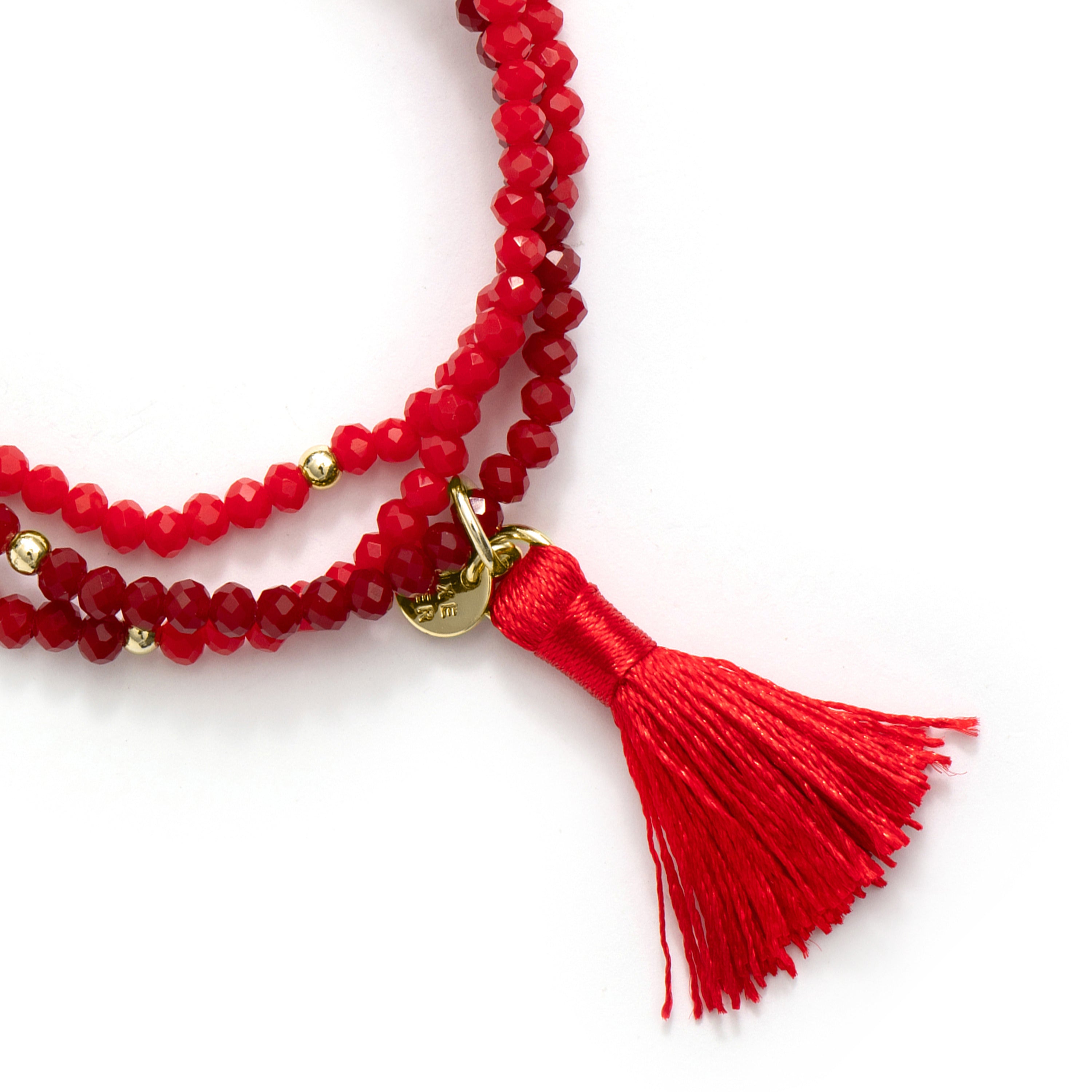 Pulsera de Aleación de Metal y Cristal Rojo acabado en oro amarillo de 18k - Hamdora