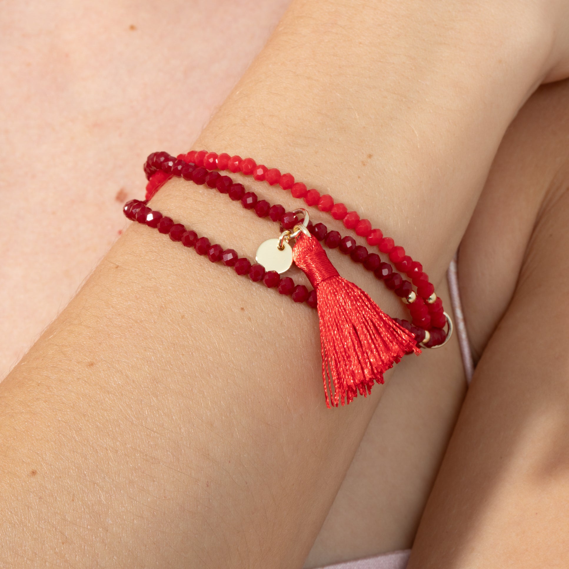 Pulsera de Aleación de Metal y Cristal Rojo acabado en oro amarillo de 18k - Hamdora
