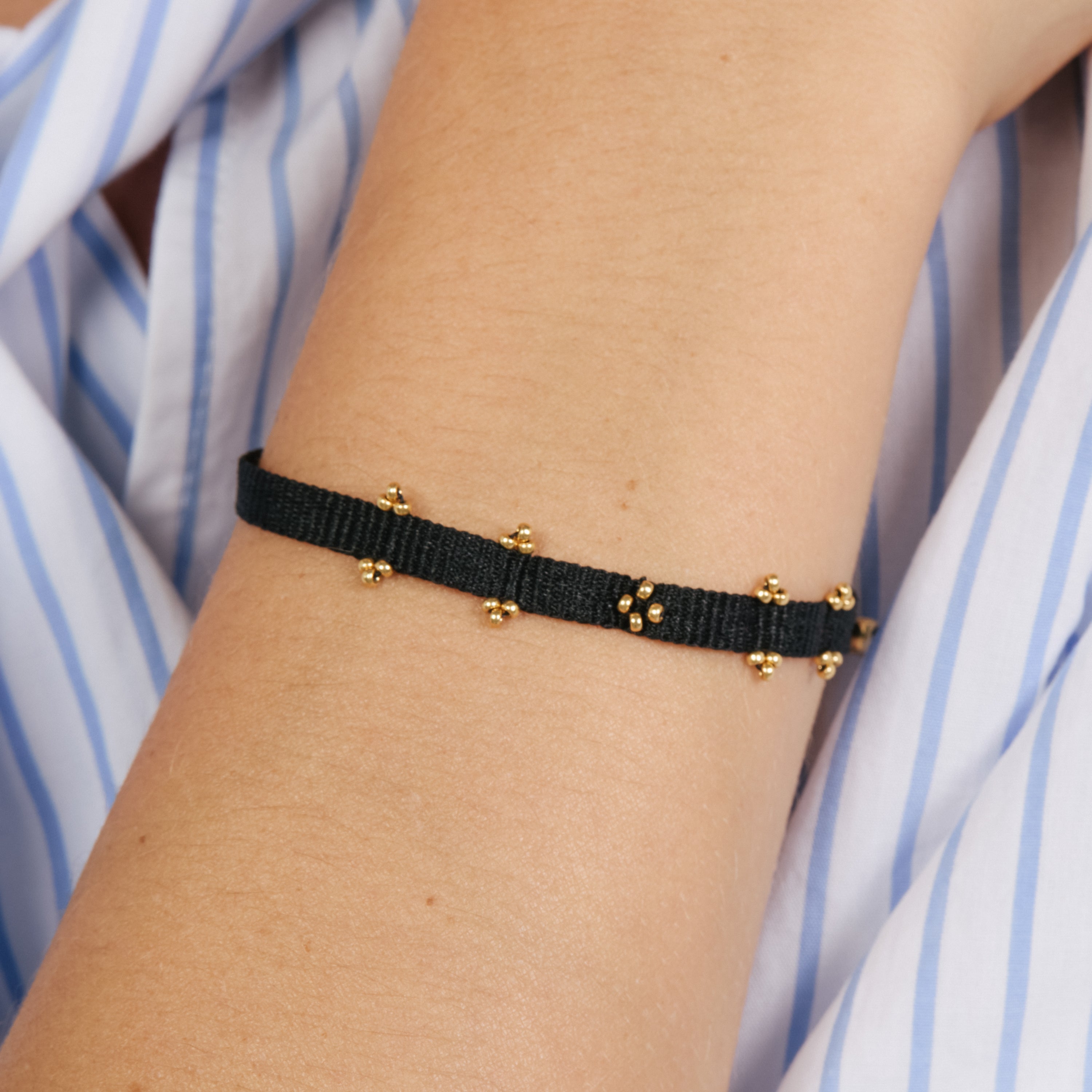 Pulsera de Algodon negro acabado en oro amarillo de 18k - Raca