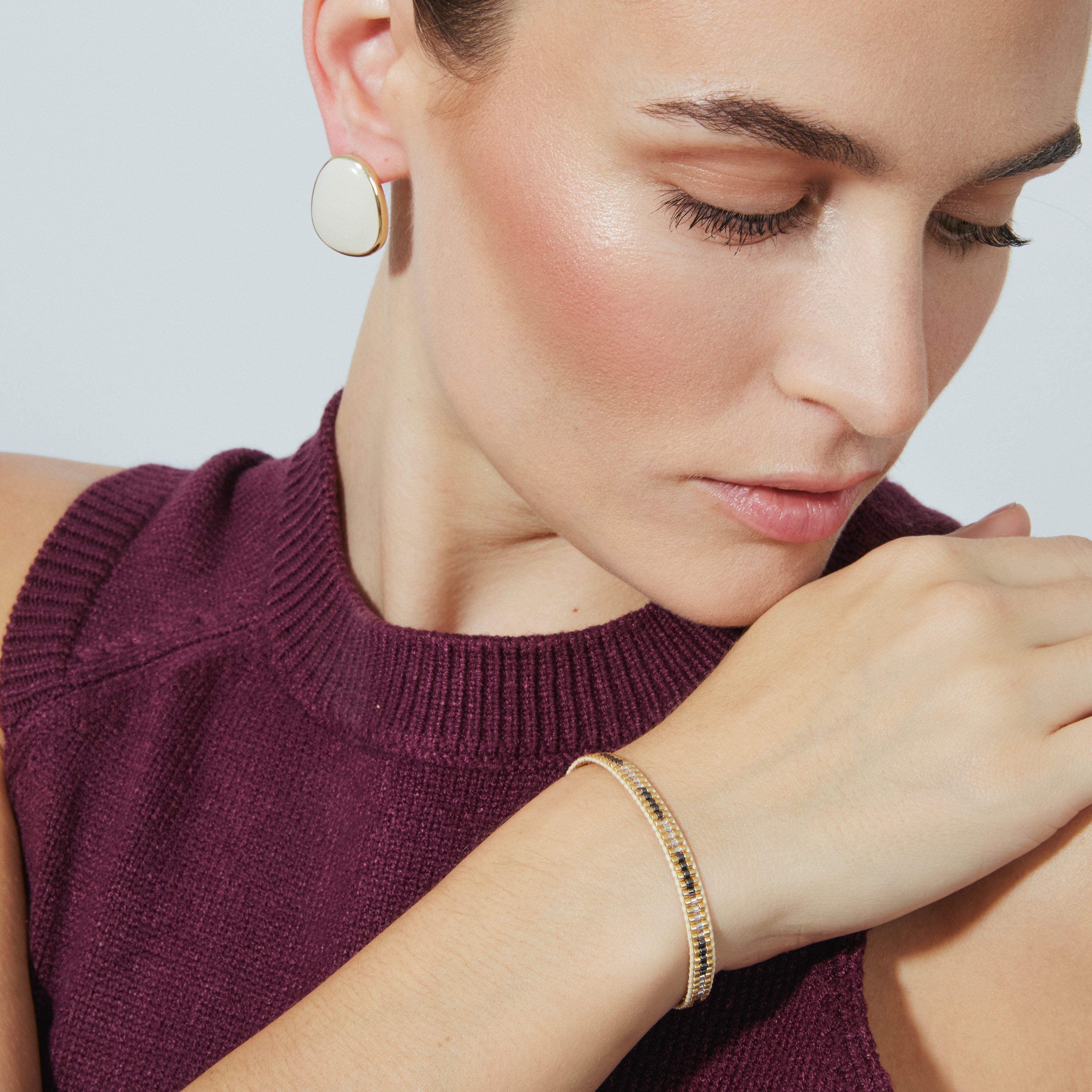 Brincos com acabamento em ouro amarelo 18K - Malius