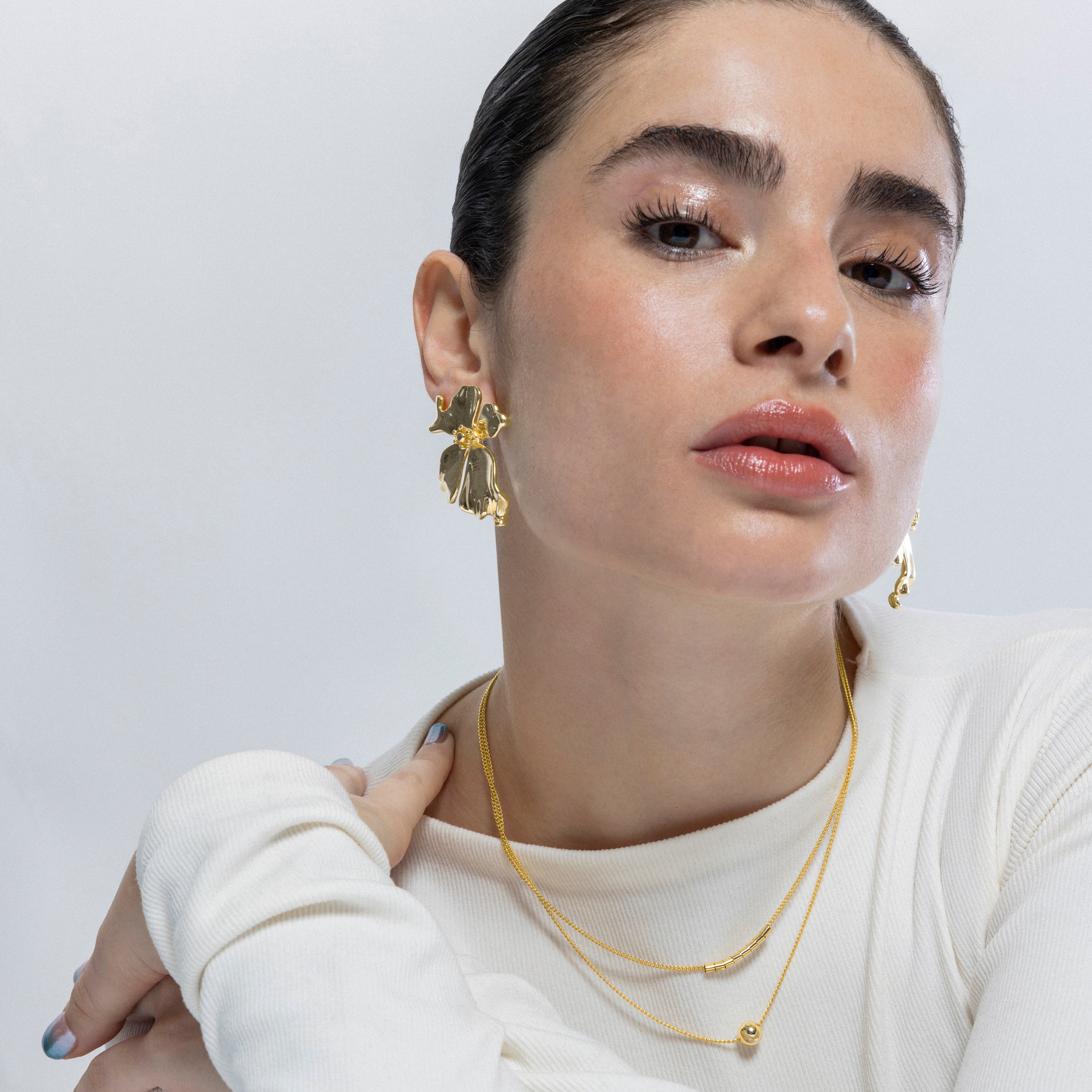 Brincos acabados em ouro amarelo 18K - Haiqua