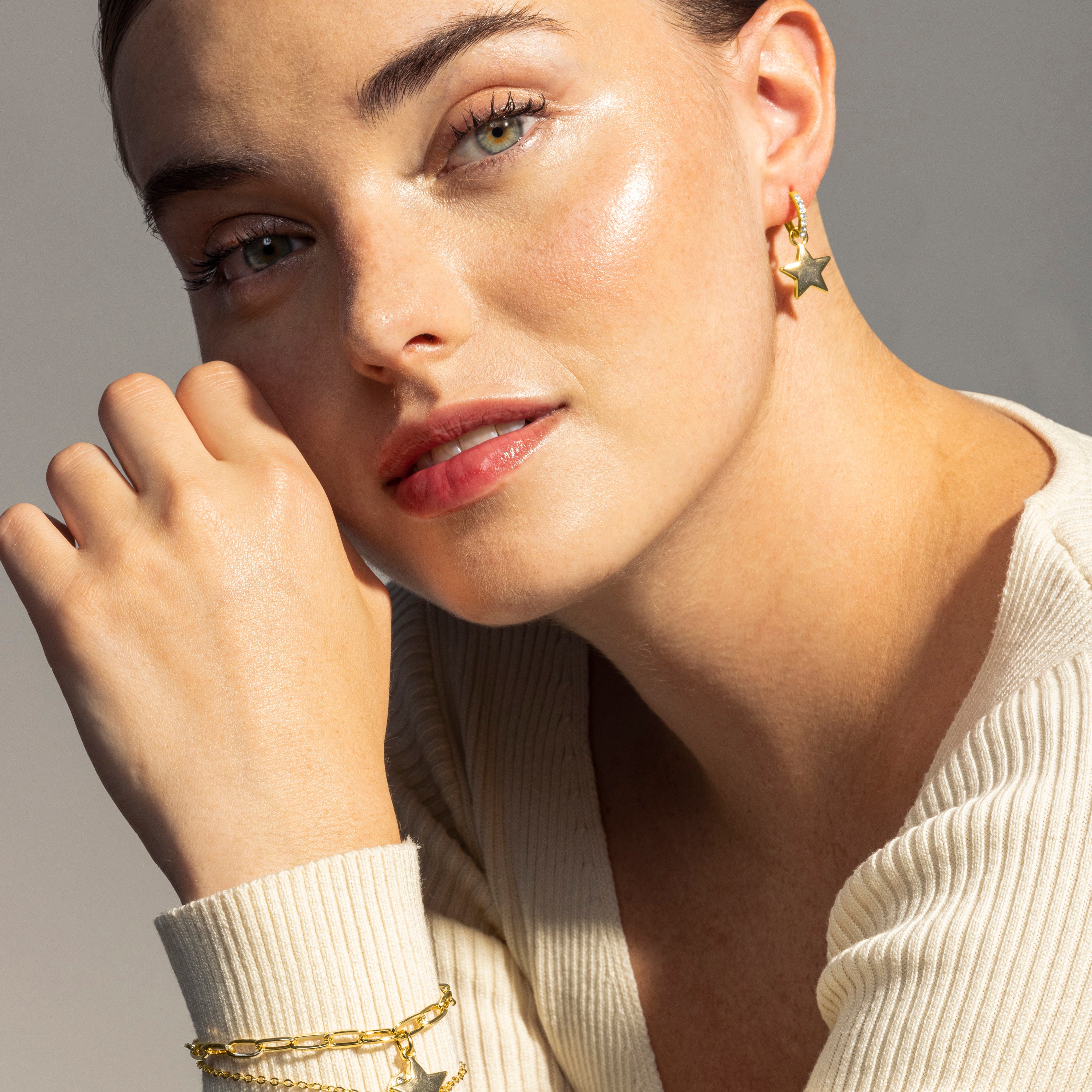 Brilliant Zirconia Earrings finished in 18K yellow gold - Star