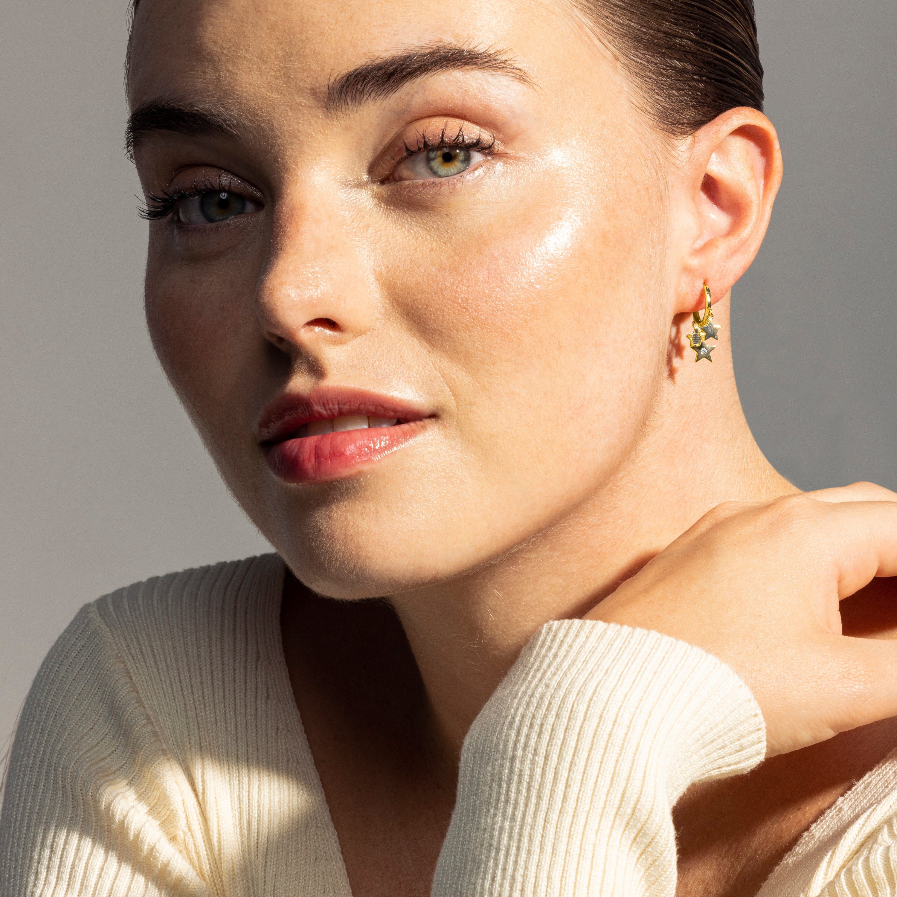 Brilliant Zirconia Earrings finished in 18K yellow gold - Star