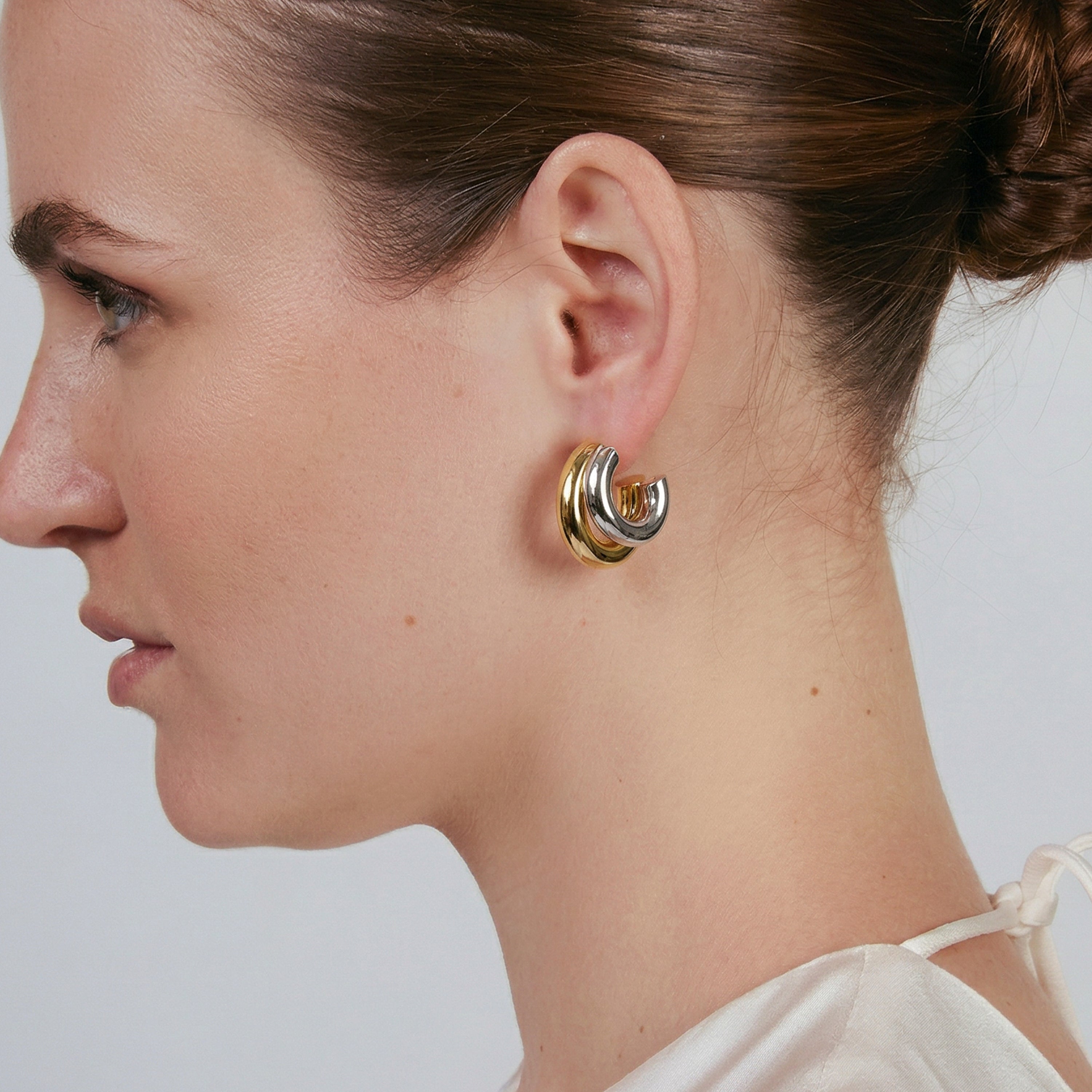 Brincos com acabamento em ouro amarelo 18k - Derck